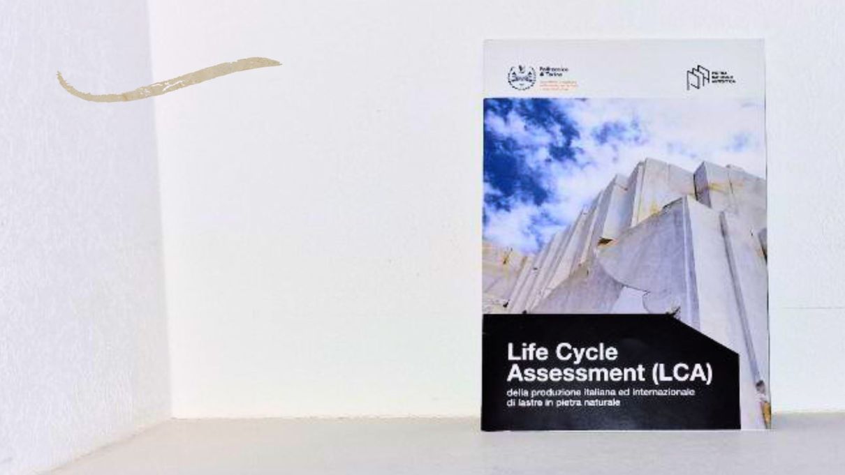 Life Cycle Assessment research printed and bound, placed on a white shelf